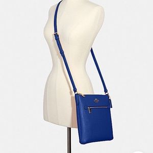 Brand new blue coach purse with tags never been used!